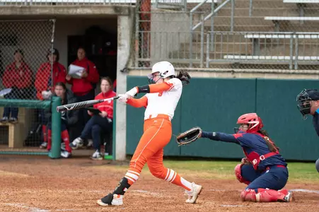 Kylie Hobbs hits against Dayton
