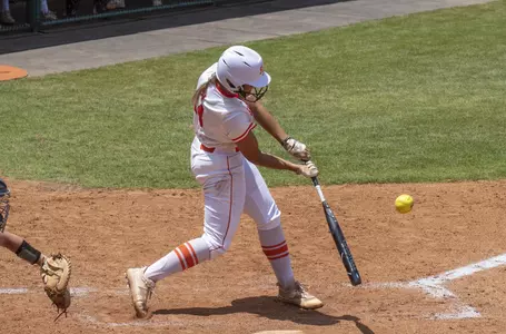 Emily Telg hits a two-run double against NM State