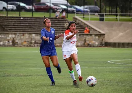 Kailey Pena kicks the ball against HBU