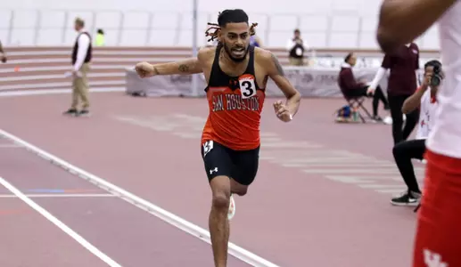Elijah McWilliams runs at the Texas A&M indoor meet