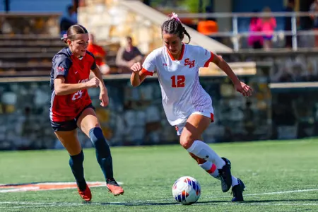 Landri Townsend dribbles against WKU