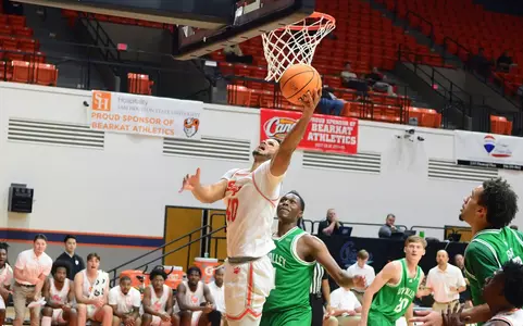 Kian Scroggins goes up for a shot against Utah Valley