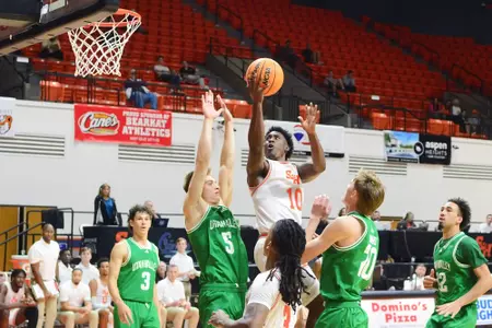 Damon Nicholas Jr. shoots against Utah Valley