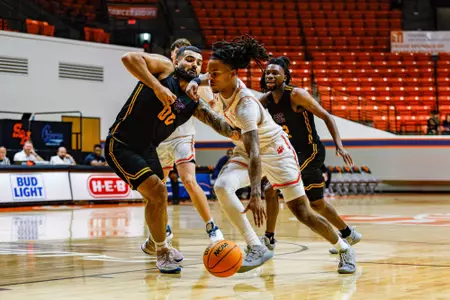 Lamar Wilkerson drives the lane against Paul Quinn
