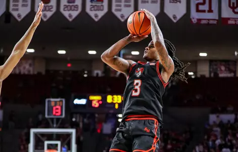 Lamar Wilkerson shoots against Oklahoma