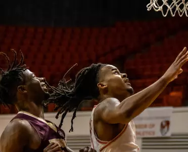 Lamar Wilkerson under the basket against Texas State
