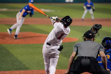 Myles Jefferson swings at a pitch against McNeese