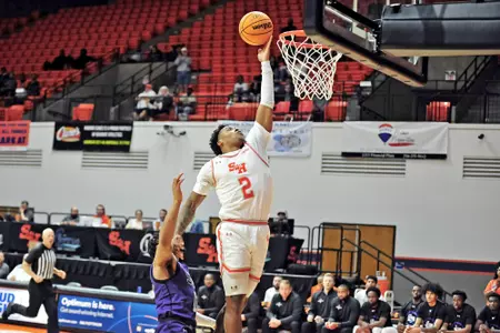 Qua Grants lays in a basket against SFA