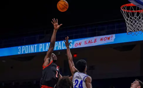 Kaosi Ezeagu shoots over a UTA defender