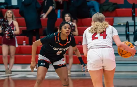 Tierney Coleman guards a Seattle player