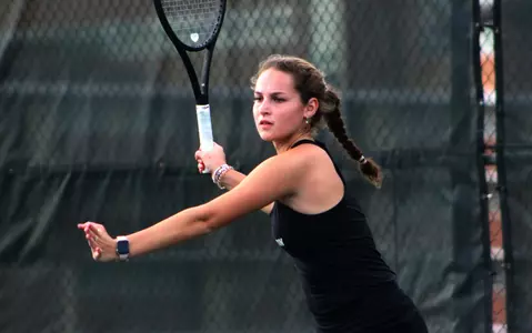 Vianne Schwab gets ready to return a shot