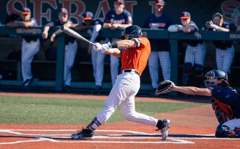 Walker Janek bats against Illinois