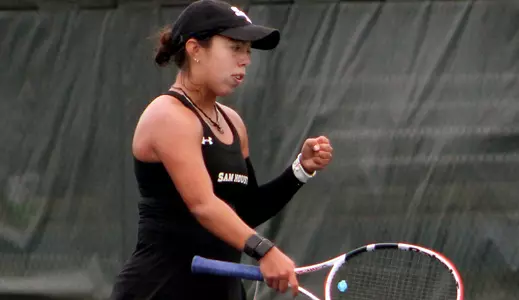 Paula Cerda celebrates winning a point