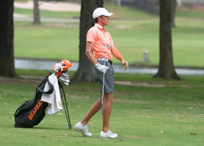 Bret Gray watches his approach shot at the Bearkat Invitational