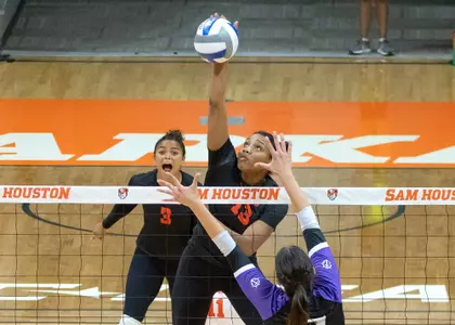 Alyssa Fielder hits the ball against Portland