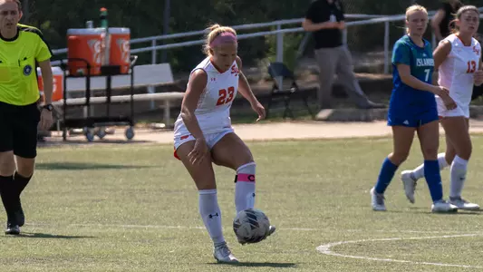 Dana Hanson dribbles against A&M-Corpus Christi