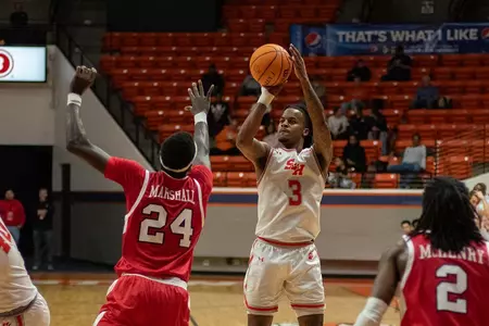 Lamar Wilkerson shoots against Western Kentucky