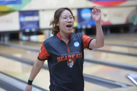 Noey Sartong reacts to a bowling a frame
