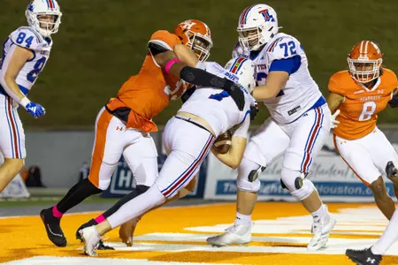 Kendrick DuJour sacks Louisiana Tech quarterback Evan Bullock for a safety