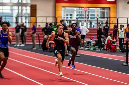 Jayden Jones competes at an indoor meet