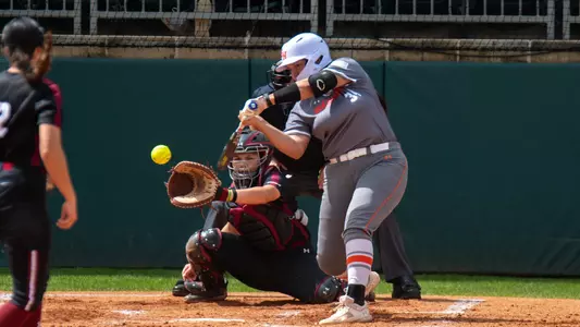Elia Hebel swings at a pitch against NM State