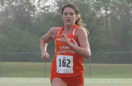 Alyssa Dooley competes in a cross country meet