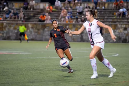 Pam Murray chases after a UIW player