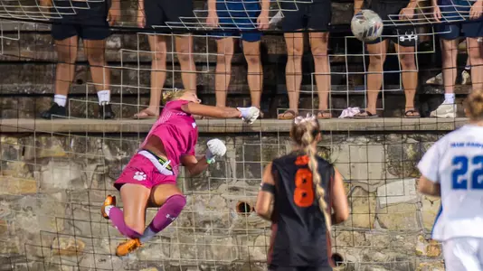 Katie Bahn makes a diving save against Middle Tennessee State