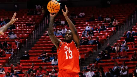 Isaiah Manning shoots against Utah