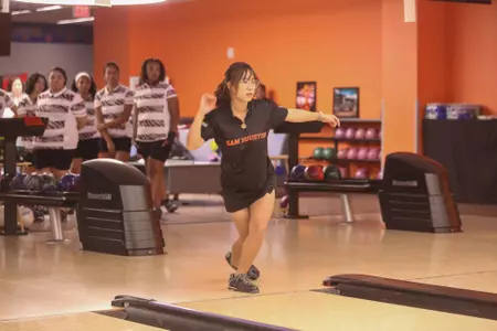 Noey Sarntong rolls a strike at the Kat Klub Classic