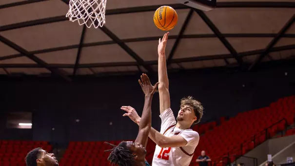 Matt Dann goes up for a shot against Biblical Studies