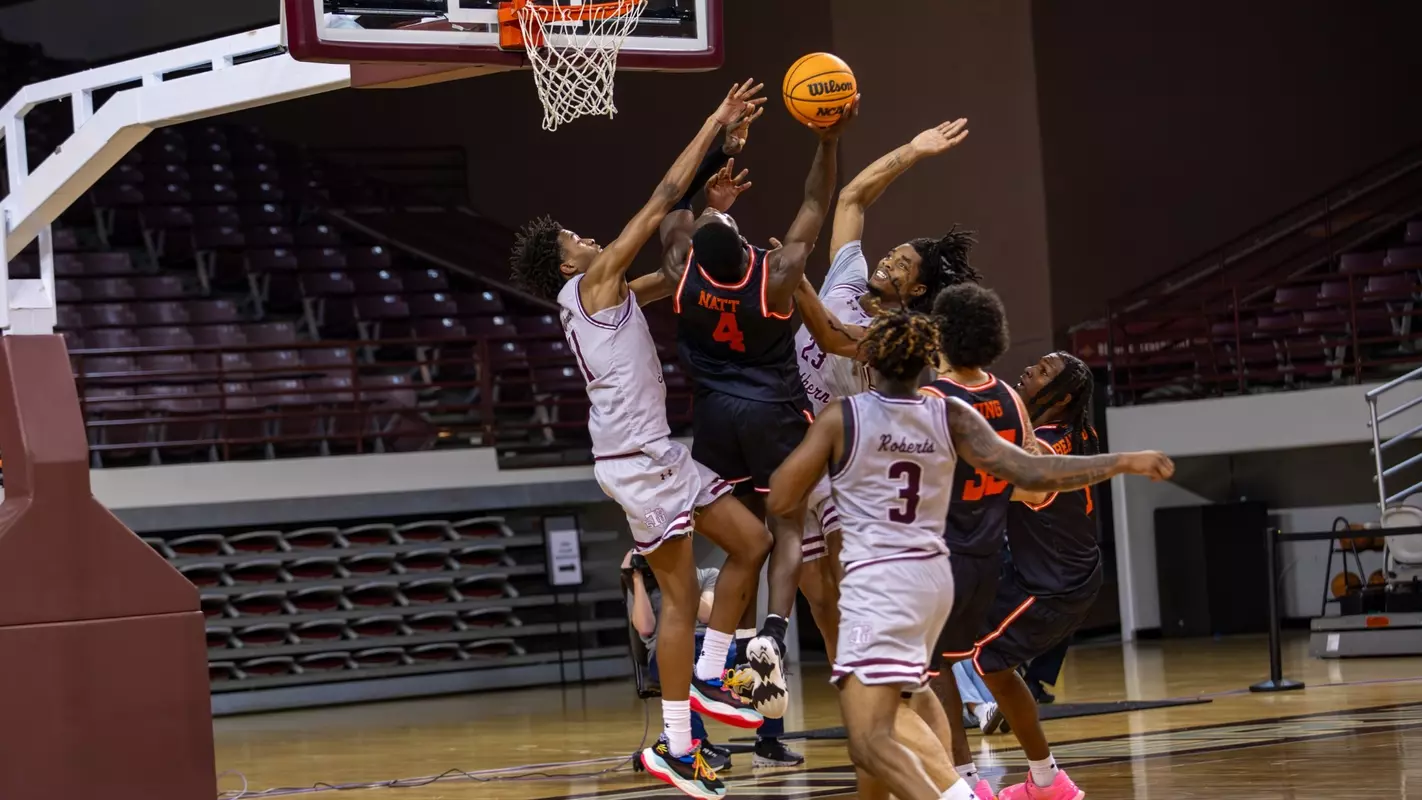 Kashie Natt fights his way to the basket against Texas Southern
