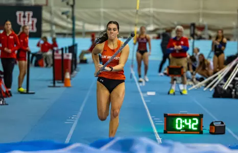Emma Peterson competes in the pole vault at Houston