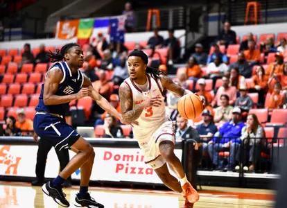 Lamar Wilkerson dribbles the baseline against UTEP