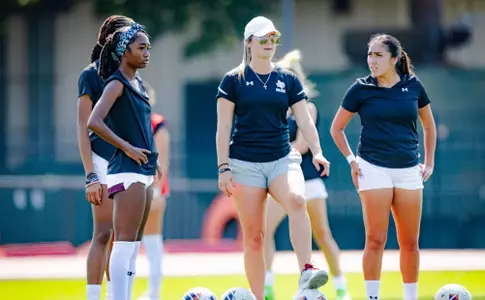 Kendall Ayers, center, has been named the new Sam Houston women’s soccer coach