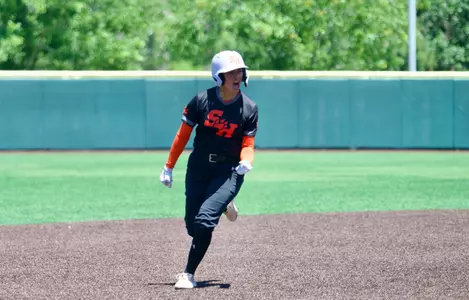 Bella Perez rounds the bases after hitting a three-run home run against LA Tech