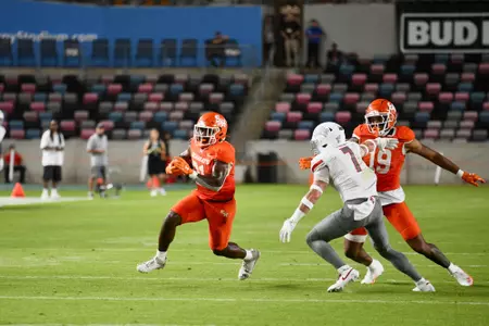 Elijah Green takes runs following a catch against UNLV at Shell Energy Stadium