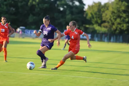 Cadence Sanders dribbles against an SFA defender