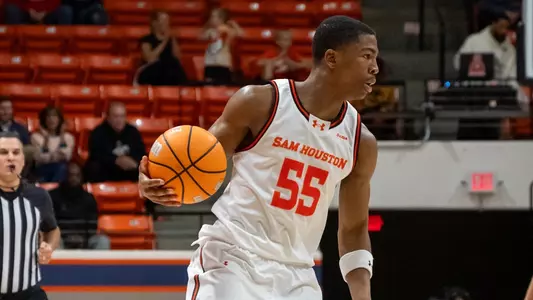 Jacob Walker looks to pass against Liberty