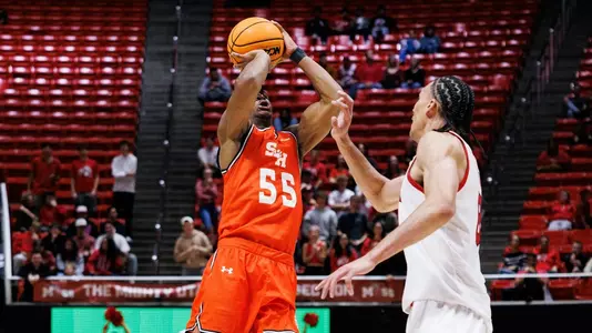 Jacob Walker shoots against Texas Tech