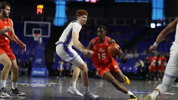 Damon Nicholas Jr. drives the baseline against MTSU