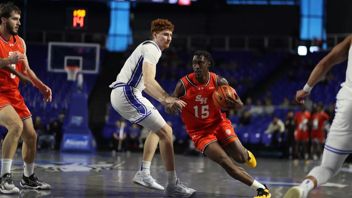 Damon Nicholas Jr. drives the baseline against MTSU
