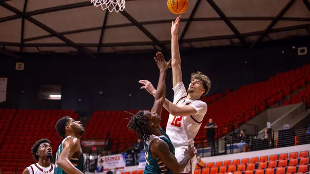 Matt Dann goes up for a shot against Biblical Studies