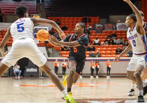 Justin Begg looks to pass against LA Tech at Johnson Coliseum
