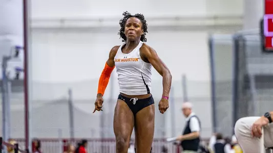 Nia Thompson prepares to leap in the long jump at the Charlie Thomas Invitational
