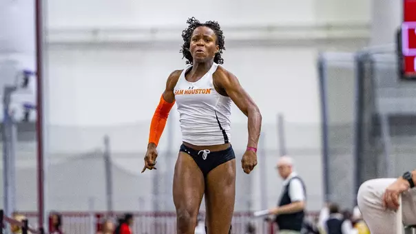 Nia Thompson prepares to leap in the long jump at the Charlie Thomas Invitational