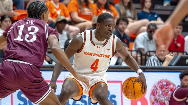 Kashie Natt dribbles against MO State