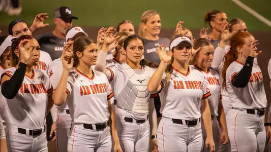 The Sam Houston softball team celebrates after a win