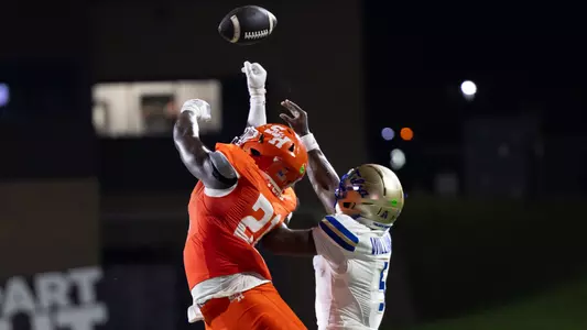 Linebacker Dean Ford breaks up a pass against Tulsa at Bowers Stadium