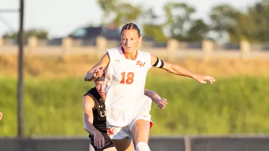 Hannah Bolin dribbles against Lamar